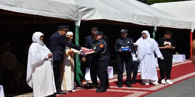 تكريم أسرة الشرطي هشام في ذكرى تأسيس الأمن الوطني jpeg